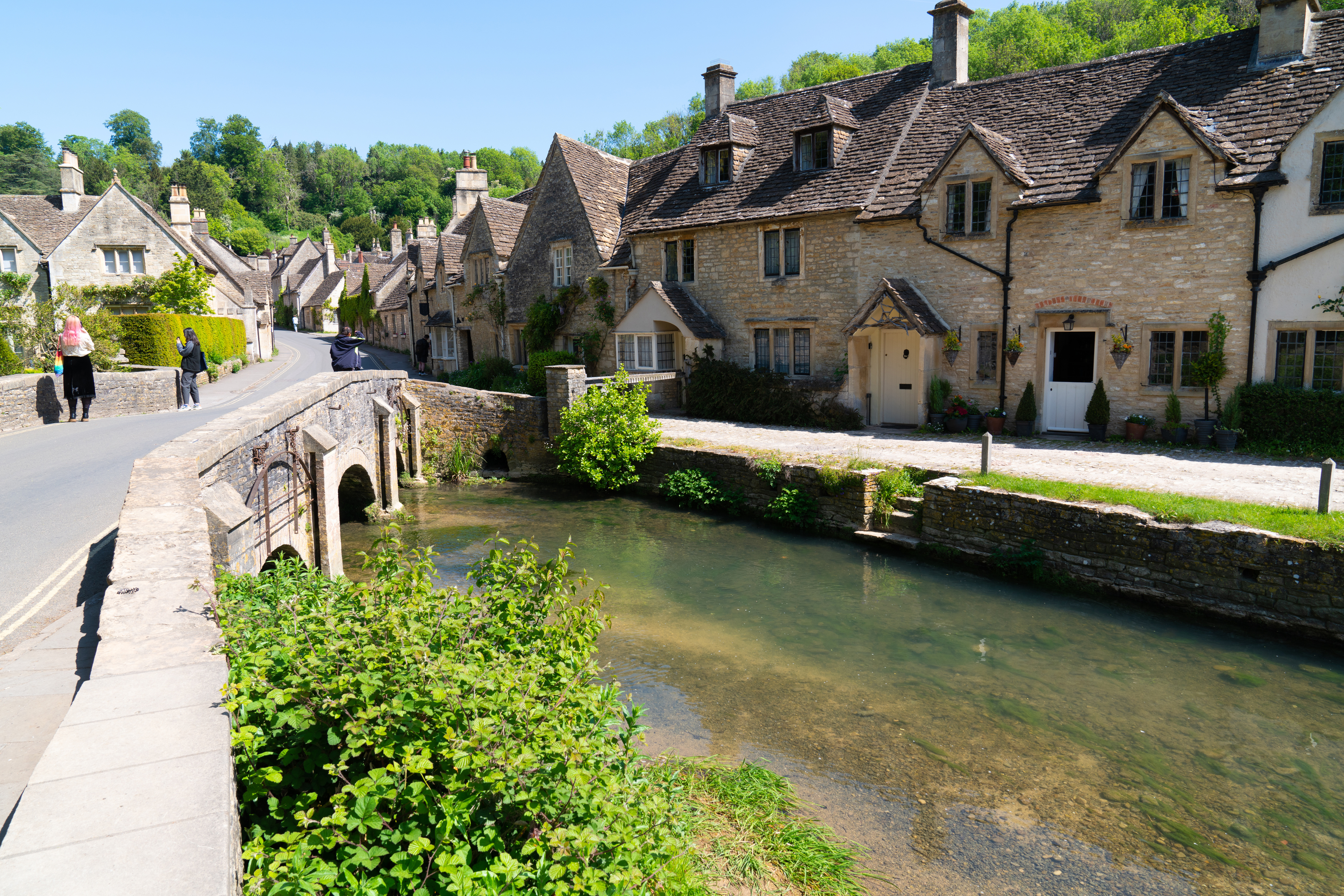 Castle Combe Wiltshire By Brook stream running through beautiful village England UK